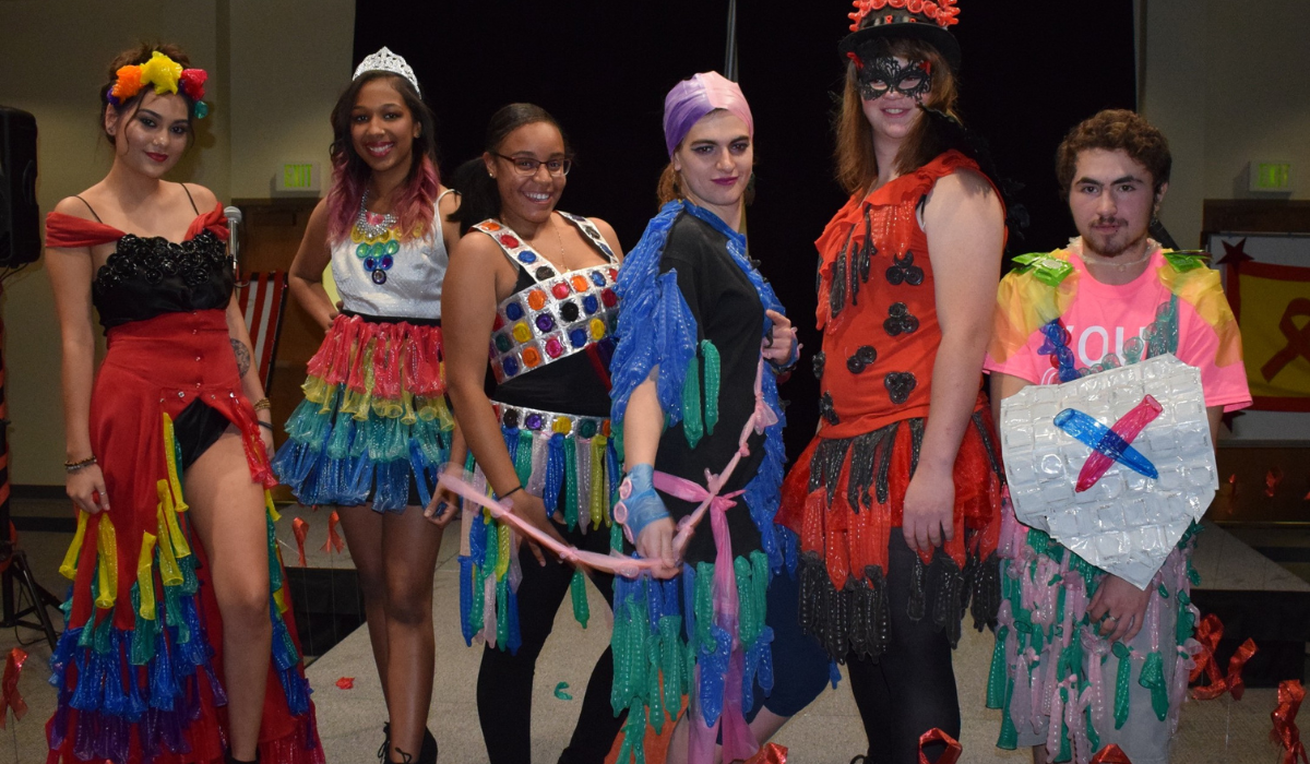 Six students dressed for the condom fashion show