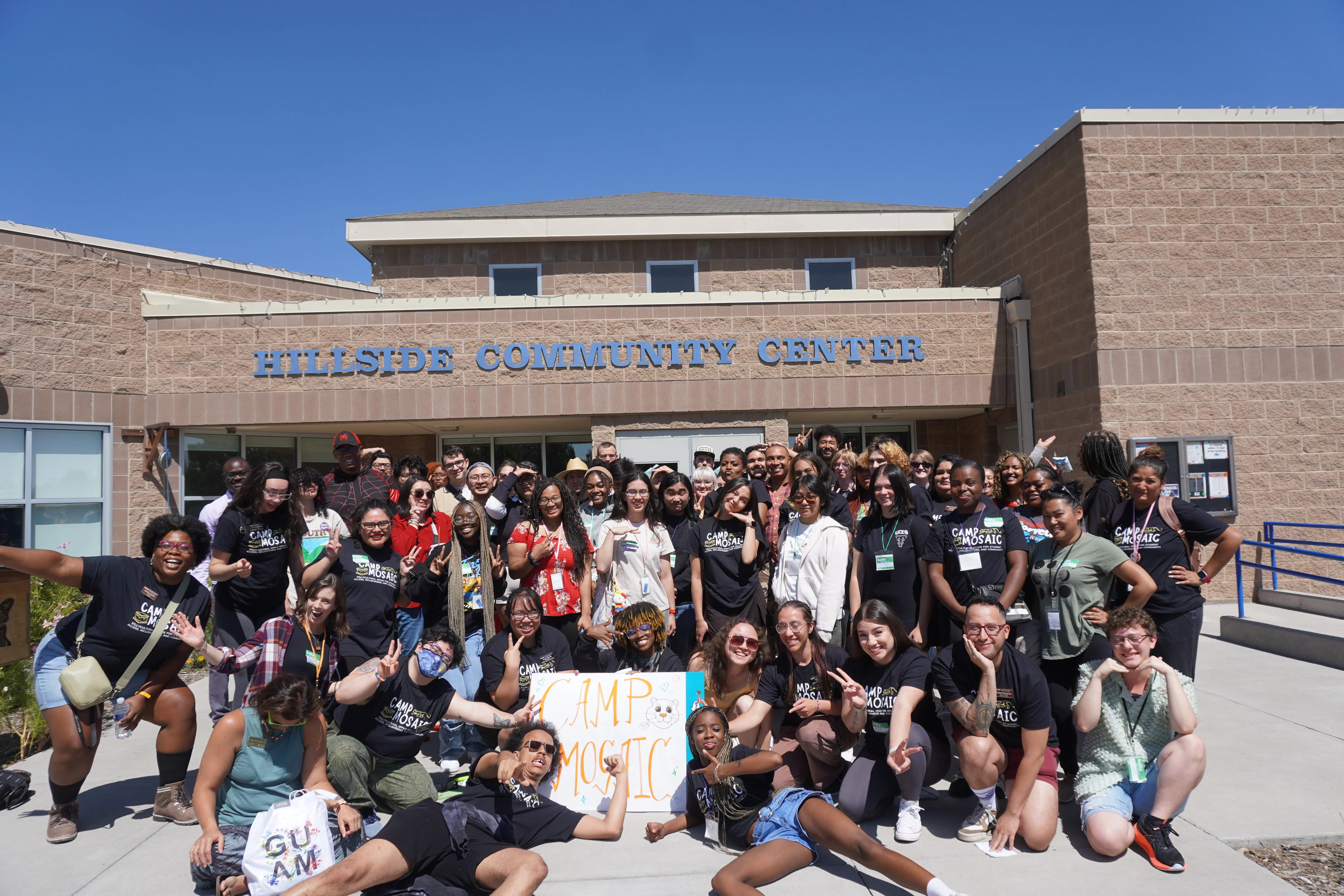 Students posing as a group in front of the Hillside Community Center